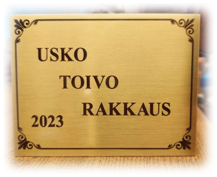 Hautakilpi/muistolaatta